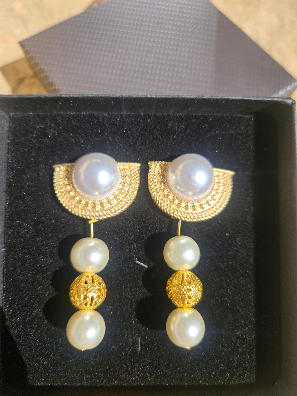 Pendientes Musca