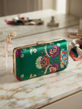 Bolso de mano verde con flores bordadas multicolor, borde dorado y cierre metálico