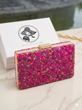 Clutch pedrería fucsia